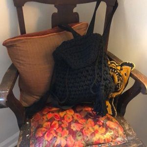 Black woven mini backpack